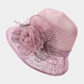 Detail of pink organza sun hat with large floral decoration and black mesh veil - Pink