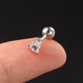 Macro view of teardrop zircon piercing stud on fingertip showing actual small size - Style 6 / Silver