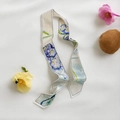 Detail of silk scarf featuring Van Gogh iris oil painting print on white background - Beige Irises