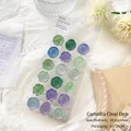 Green wax seal stickers with camellia motifs and translucent finish for gift wrapping - Camellia Dew Green