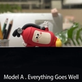 Cute red fire extinguisher figurine ornament with a smiling face for desk decor - 3079 Lying Extinguisher