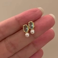 Golden starburst earrings with oval green gemstone and white round pearl dangles - Gold Oval Green Gem Artificial Pearl Ear Clip (7583 Ear Clip)