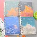 Set of four A7 spiral notebooks featuring cute cloud and bear illustration covers - Collecting Clouds