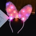 Pink plush rabbit ear headband with glowing LED lights and warm battery-powered lighting - Bunny Ear Headband / New Pink + Colorful Light