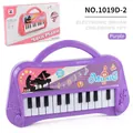 22-key purple cartoon toy electronic piano with handle and colorful music packaging - Model 1019D-1 / Purple