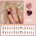 Unghie finte a mandorla lunghe con design marmorizzato rosso e ciondoli a cuore - Stile D882 (Tipo di colla)