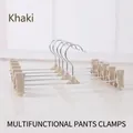 Set of 5 khaki non-slip plastic pants hangers with adjustable clips for organizing skirts - Ax Clip Khaki