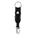 Detail of woven black cotton hat clip with a natural wooden bead and metal clasp - Black Style D