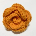 Handmade crochet orange rose flower accessory with detailed knitted yarn texture - Orange Rose