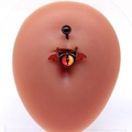Gothic belly button ring featuring red bat wings and demon eye on a silicone model - Red Bat Wing (#1)