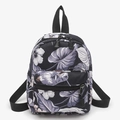 Minimalist canvas backpack with tropical floral pattern and dual zipper compartments - Black Floral