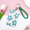 Floral ID card holder in teal and pink with woven wrist strap and key chain - Green Edged Leather Rope / Green Pink