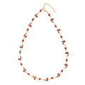 Golden necklace featuring red cherry pendants and green leaves on a white background - 001 Cherry / Necklace