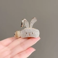 Pince à cheveux lapin dorée avec strass scintillants pour queue de cheval haute - Design d'oreilles de lapin / Or