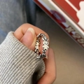 Silver twist open ring featuring linked cartoon rabbit designs with a textured finish - Cartoon Rabbit Connected Open Ring (J3521)