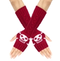 Detail of red knit arm warmers featuring a white skull pattern and fingerless design - One Size / Wine Red