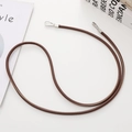 Close-up of 6mm dark brown leather phone strap with premium silver metal clasp detail - 6mm Round Rope / 62cm / Brown