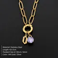 Stainless steel gold chain necklace with letter O charm and purple crystal pendant - Lowercase o