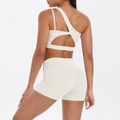 Cream one-shoulder sports bra and high-waist shorts set with open back design - S / Light Ivory