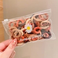 Lot d'élastiques à cheveux tons terre avec texture tressée en pochette - Lot de 50 / Café Foncé