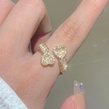 Elegant gold open heart ring featuring pave crystals and baguette cut gemstones - KC Gold