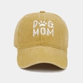 Close-up of mustard yellow washed cotton baseball cap with white DOG MOM embroidery - Adjustable / Yellow
