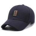 Donkerblauwe baseballpet met honingraattextuur en een bruine kunstlederen patch - Verstelbaar / Marineblauw