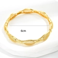 Golden woven mesh bangle with wavy edges and 6cm inner diameter on stone base - Gold - Hollow Wave