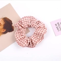 Chic pink and white checkered fabric scrunchie in Korean style for stylish hair styling - Pink