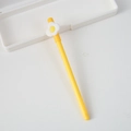 Cute yellow cartoon gel pen with white flower ornament and soft silicone grip texture - Egg