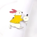 Detail of metal Easter rabbit napkin ring with clock and yellow jacket on white napkin - White Rabbit Style with Yellow Coat and Pocket Watch (5)