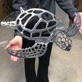 Large metal sea turtle wall art featuring intricate hollow carved design in silver finish - Silver