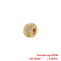 Macro detail of hollow flower pattern bead in gold finish with sparkling cubic zirconia - Gold VZ380 4*6mm