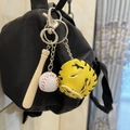 Three-piece baseball keychain with white ball, wooden bat, and yellow glove on bag - 2CM White Ball Long Bat Yellow Glove with Black Strap