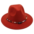 Detail of red wool fedora hat featuring a bohemian woven band with colorful bead accents - One Size / Rust Red (Obsidian Decoration)