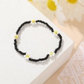 Bohemian beaded choker with black seed beads and white daisy flowers for women - Black Daisy Bracelet