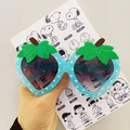 Cute strawberry-shaped children's sunglasses with blue polka dot frames and purple lenses - Blue