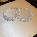 Detailed view of gold hoop earrings featuring a gradient of white faux pearls on silk - 58# Silver Pin - Gold Pearl Large Hoop