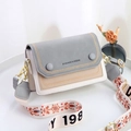 Three-tone patchwork crossbody bag with gray and beige panels and floral jacquard strap - Gray