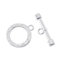 Close-up of vintage silver plated round OT toggle clasp with intricate engraved floral pattern - Rune Circle Toggle Clasp / White Gold