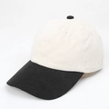 Detailansicht der Cord-Struktur auf schwarz-weißer Kontrast-Baseballkappe Stoff - Verstellbar / Creme/Schwarz
