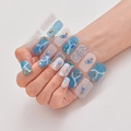 Macro detail of blue marble nail stickers with gold stars and glitter on a white background - Blue Marble Ocean Style (DQ3-100)