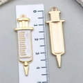 Golden syringe charms with white enamel and scale details, length measured at 4cm - Large KC Gold White Syringe
