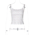 Close-up of white cropped tank top with red cherry print and delicate spaghetti straps - S / White/Cherry Print