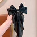 Large black satin bow hair clip with long ribbons and elegant minimalist design - Black
