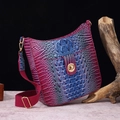 Detail of gradient crocodile embossed bag with gold hardware and fabric shoulder strap - Purple & Blue