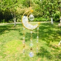 Detail of golden moon suncatcher with clear natural stones and hanging crystal prisms - 8cm Quicksand Moon / Opalite (Synthetic)