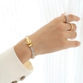 Elegante gouden schakelarmband met baguette-zirkonia en handige magneetsluiting - Goud Witte Zirkonia