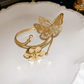 Detail of golden cutout butterfly and flower cuff bracelet on white porcelain plate - Gold Hollow Big Butterfly Style (HB2499)