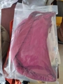 Deep red nylon dumpling crossbody bag in clear packaging showing compact lightweight design - Burgundy